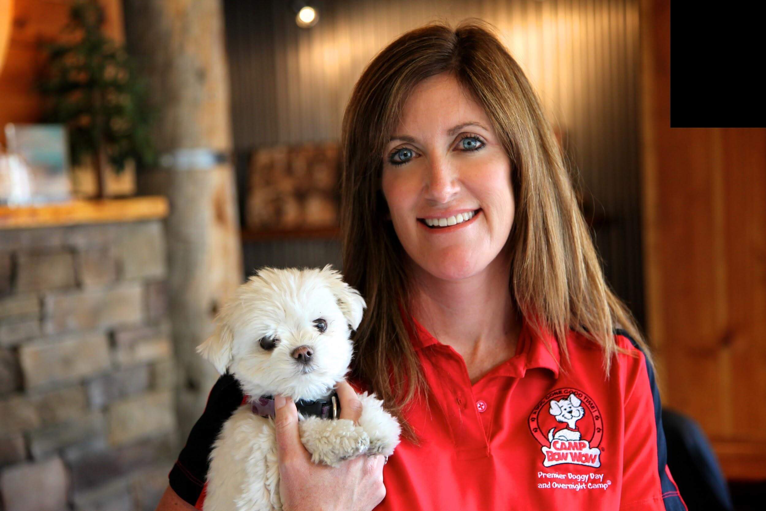 Heidi Ganahl holding puppy